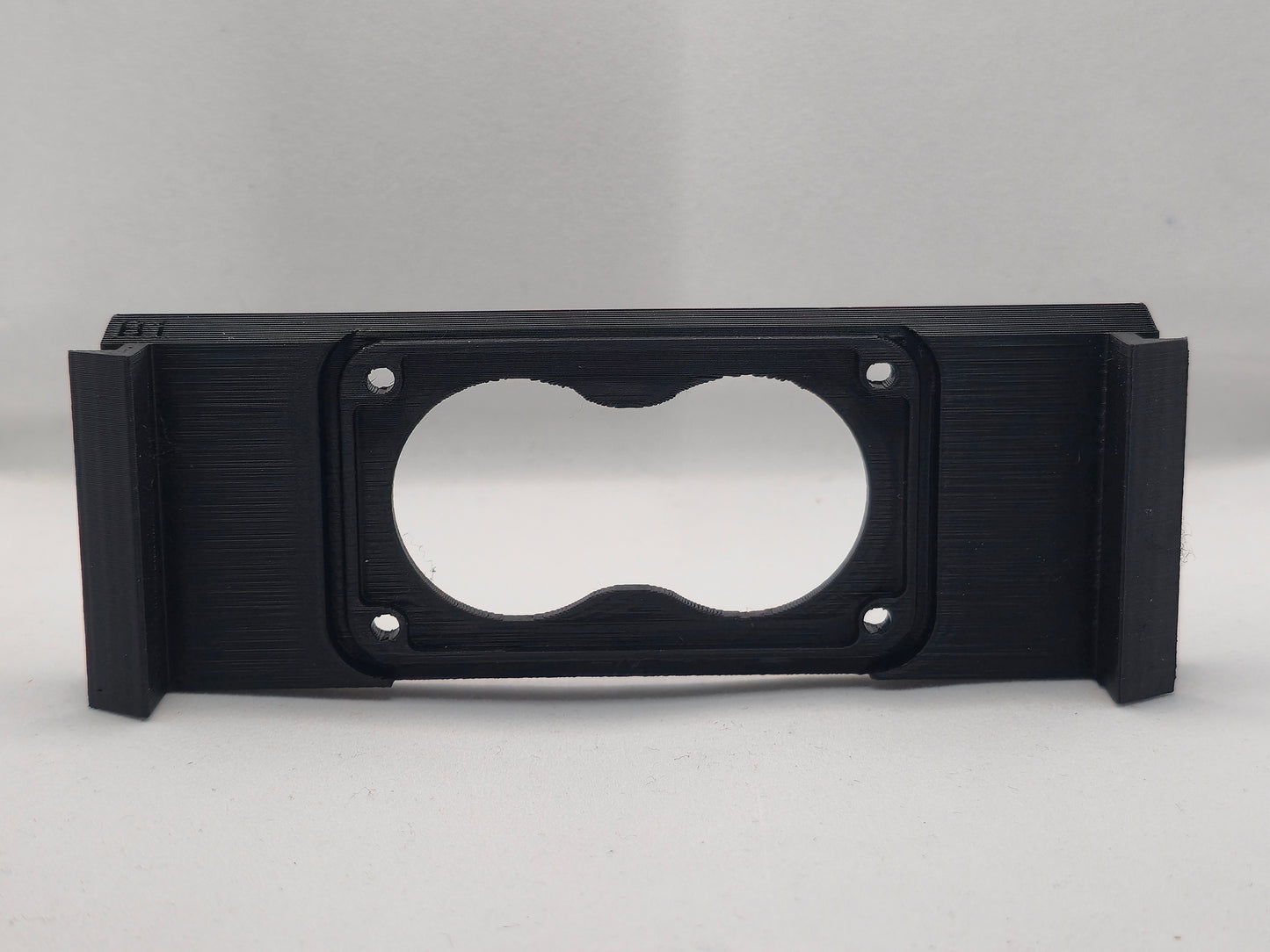 Cmatt Engineering pod light bracket mounted in 2021-2023 Ford F-150 Lariat grille